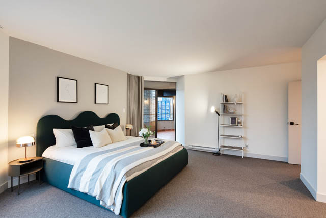 Bright bedroom with modern decor, large bed, and city view. - 1402 - 738 Broughton St, Vancouver Downtown