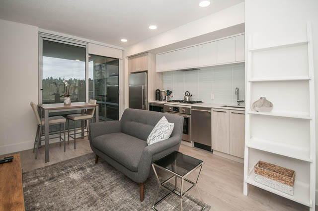 Bright kitchen with modern appliances and city view. - 907 - 680 Seylynn Crescent, North Vancouver