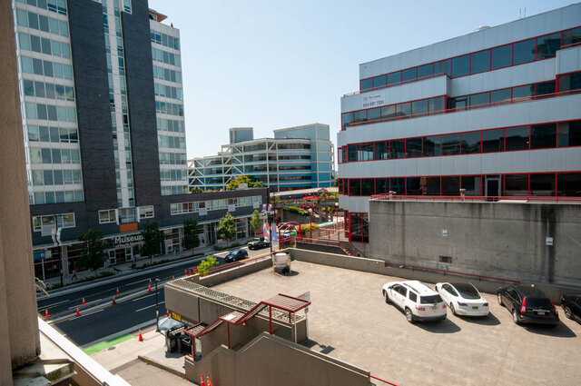 Spacious 2-bedroom condo with a city view and modern furnishings. - 313 - 108 West Esplanade Ave, North Vancouver