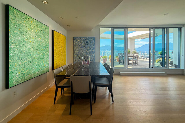 Spacious dining room with marble table, hardwood floors, and stunning city view. - WITHHELD, Vancouver Downtown