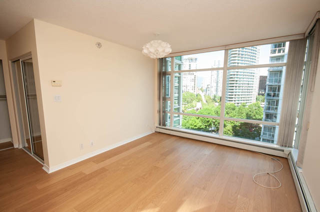 Bright living room with hardwood floors and a city view. - 1105 - 198 Aquarius Mews, Vancouver Downtown