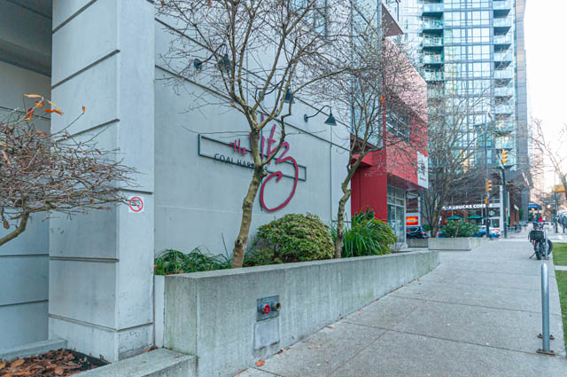Furnished living room with modern decor and city view. - 3102 - 1211 Melville Street, Vancouver Downtown