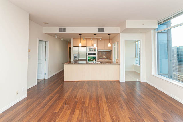 Bright kitchen with hardwood floors and city view. - 3102 - 1211 Melville Street, Vancouver Downtown