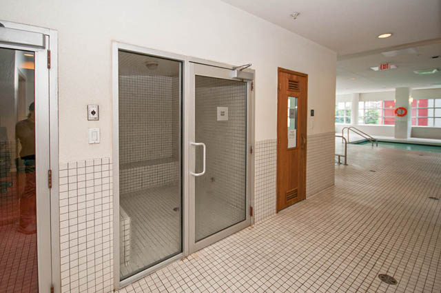 Spacious bathroom with glass shower and tiled floor. - 3102 - 1211 Melville Street, Vancouver Downtown