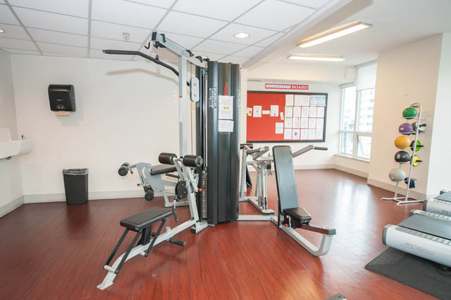 Bright gym with hardwood floors and exercise equipment, clean and organized. - 1102-833 Seymour Street, Vancouver Downtown