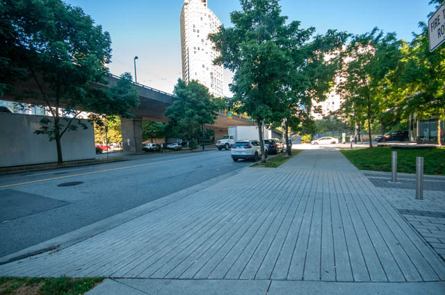 Spacious penthouse with a modern outdoor patio, featuring a brick walkway and urban views. - 2818  - 89 Nelson Street, Vancouver Downtown