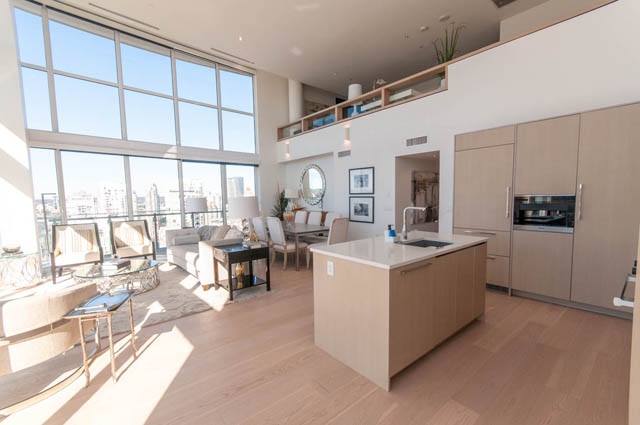 Spacious penthouse with hardwood floors, large windows, and a city view. - 2818  - 89 Nelson Street, Vancouver Downtown