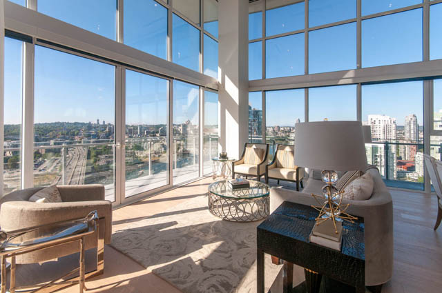 Spacious penthouse living room with floor-to-ceiling windows, city views, and modern furnishings. - 2818  - 89 Nelson Street, Vancouver Downtown
