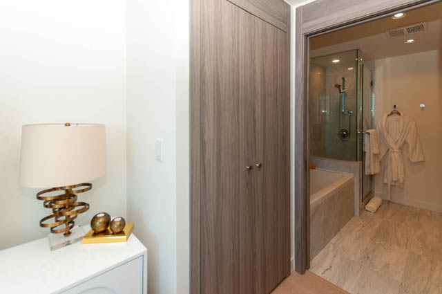 Spacious penthouse bathroom with marble countertops and a walk-in shower. - 2818  - 89 Nelson Street, Vancouver Downtown