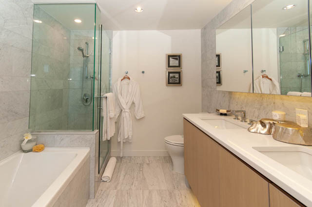 Spacious bathroom with marble countertops, a walk-in shower, and a large vanity. - 2818  - 89 Nelson Street, Vancouver Downtown