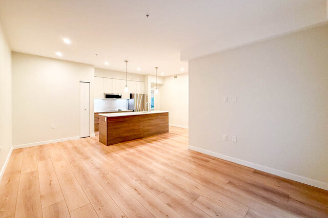 The dining area has hardwood floors and recessed ceiling lights. - G 3- 2030 East 20th Ave, Vancouver East Side