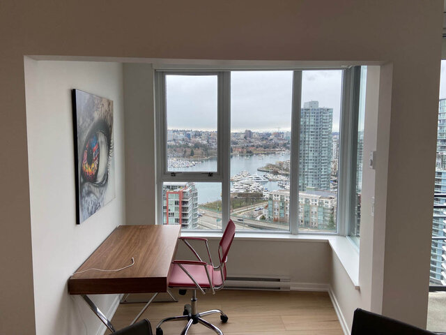Bright office with hardwood floors, city view, and modern artwork. - 3006 - 33 Smithe Street, Vancouver Downtown
