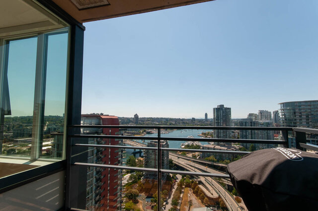 Spacious balcony with stunning city view and modern furnishings. - 3006 - 33 Smithe Street, Vancouver Downtown