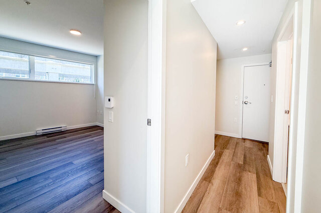 Spacious closet with light wood flooring and adjustable wire shelving. - 400 - 3588 Hull St, Vancouver East Side