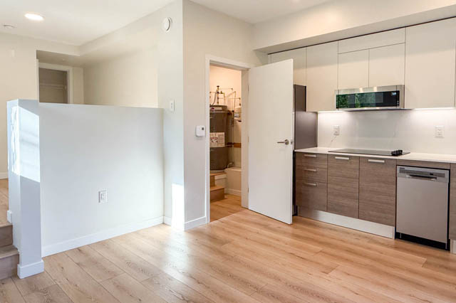 Bright kitchen with light wood countertops and hardwood floors. - G 22 - 2070 East 20th Ave, Vancouver East Side