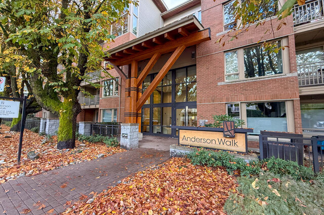 Furnished 1-bedroom + den condo with wooden beams and autumn leaves. - 526-119 West 22nd Street, North Vancouver