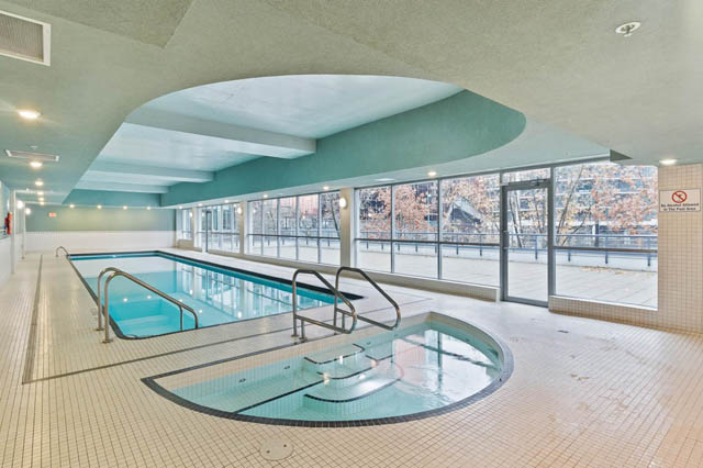 Spacious, modern 1-bedroom + den condo with a large, well-lit indoor pool and city view. - 1011- 939 Expo Blvd., Vancouver Downtown