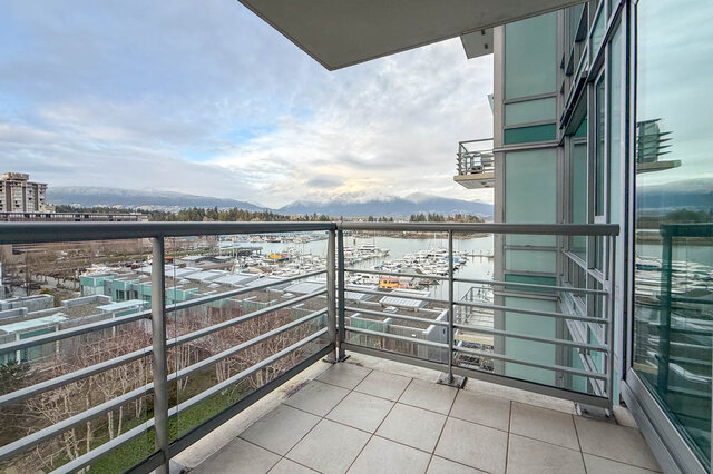 Spacious balcony with glass railings, offering stunning city and marina views. - 706-499 Broughton, Vancouver Downtown