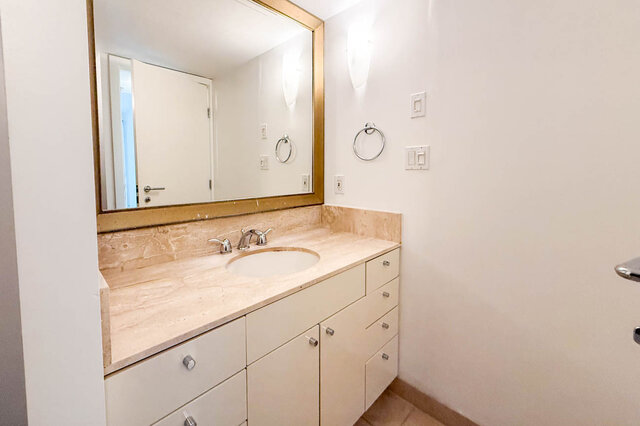 Spacious bathroom with marble countertops and a large mirror. - 706-499 Broughton, Vancouver Downtown