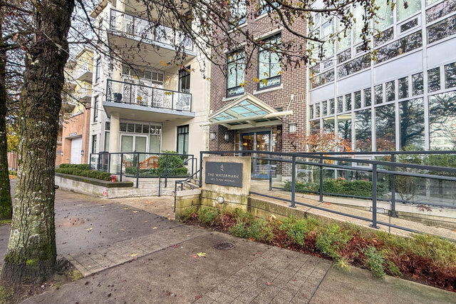 Spacious 2-bedroom + den condo with modern furnishings and a glass-enclosed entrance. - 301-605 Clyde Ave, West Vancouver