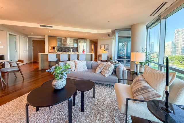 Living room with city view and modern hardwood flooring. - 3309-1111 Alberni Street, Vancouver Downtown