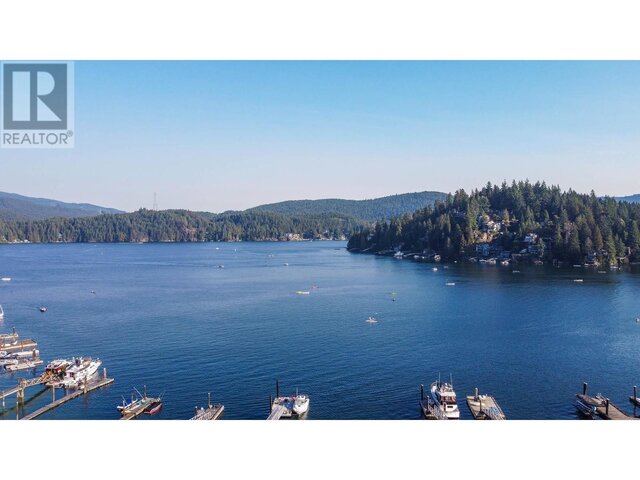 Spacious 2-bedroom furnished house with a stunning view of the lake and surrounding forest. - 2621 Panorama Drive, North Vancouver