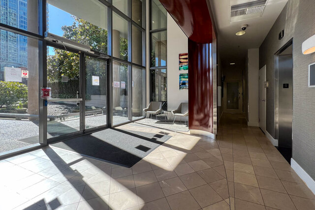 Furnished living room with large windows, city view, and modern decor. - 2905-1009 Expo Boulevard, Vancouver Downtown