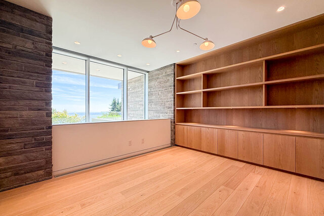 Spacious den with hardwood floors and ocean views through large windows. - 2390 Westhill Drive, West Vancouver
