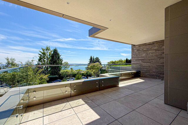 Spacious balcony with glass railings and ocean view. - 2390 Westhill Drive, West Vancouver