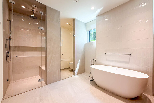 Spa-like bathroom with freestanding tub and glass-enclosed shower. - 2390 Westhill Drive, West Vancouver