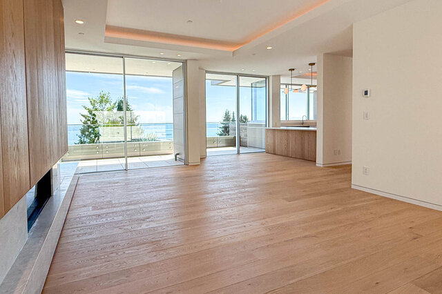 Spacious living area with hardwood floors and water view. - 2390 Westhill Drive, West Vancouver