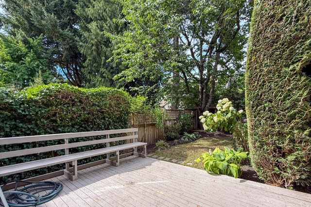 Spacious garage with concrete floors and tool storage near window. - 3443 West 6th Ave, Vancouver West Side