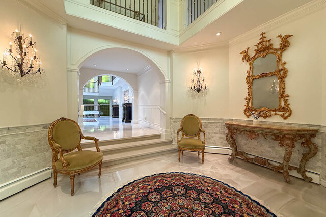 Grand lobby with ornate furniture and crystal chandeliers - 1249 Chartwell Place, West Vancouver