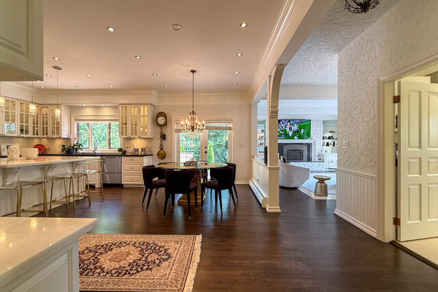 Spacious open-concept kitchen with dining area and large windows - 1249 Chartwell Place, West Vancouver