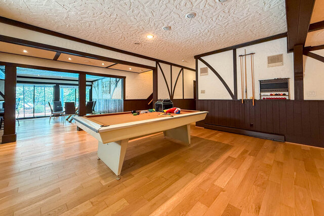 Spacious den with pool table, hardwood floors, and large windows - 1249 Chartwell Place, West Vancouver