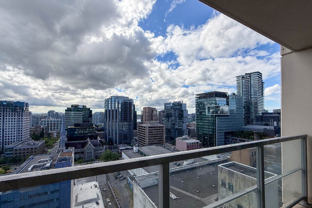 Balcony with sweeping city view and modern skyscrapers under partly cloudy skies. - 2113-610 Granville Street, Vancouver Downtown