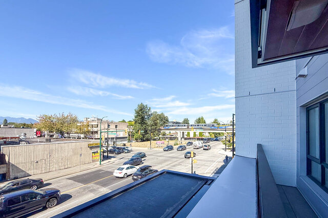 Balcony with panoramic city view and sky train. - 204-1680 East 12th Avenue, Vancouver East Side