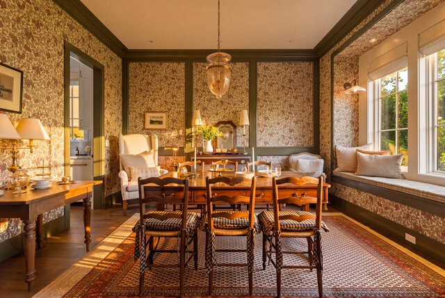 Bright dining area with a wooden table, patterned wallpaper, and large windows - 1248 Kings Avenue, West Vancouver