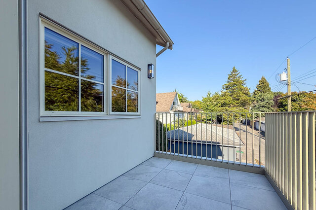 Private balcony with tiled flooring and tree-lined neighborhood view. - 3038 Vine Street, Vancouver West Side