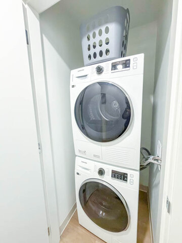 Stacked Samsung washer and dryer in their own closet. - 611-1529 Oxford Street, North Vancouver