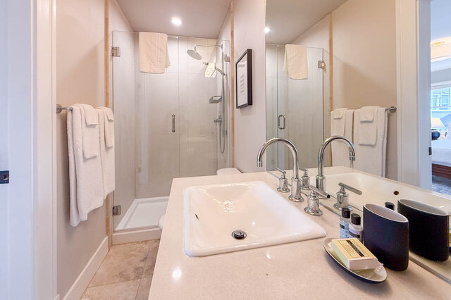 Ensuite vanity and glass shower. - North Vancouver