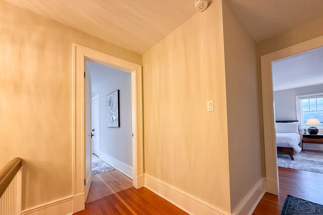 Upper hall between bedroom doors. - North Vancouver